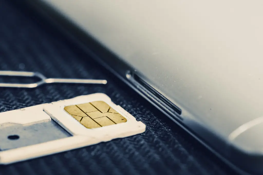 Close up of ejection tool and SIM tray so users know they can have a new sim card with the same number
