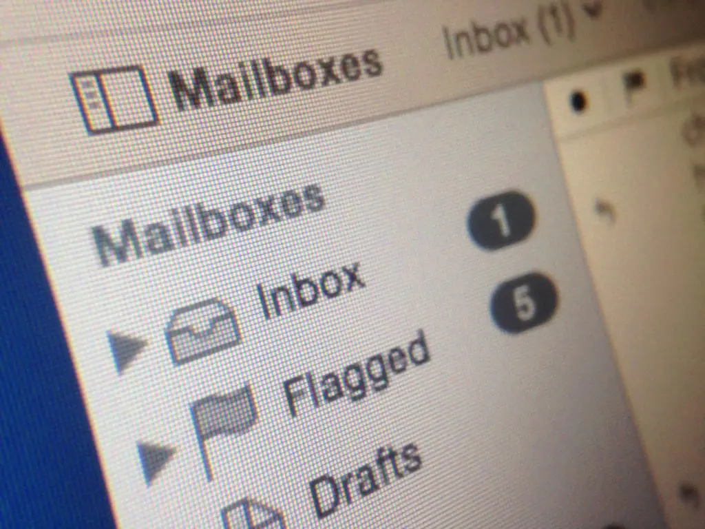 An inbox of an email program shows flagged emails.