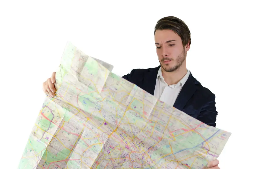 Businessman holding map wondering how to get to ccpa compliance