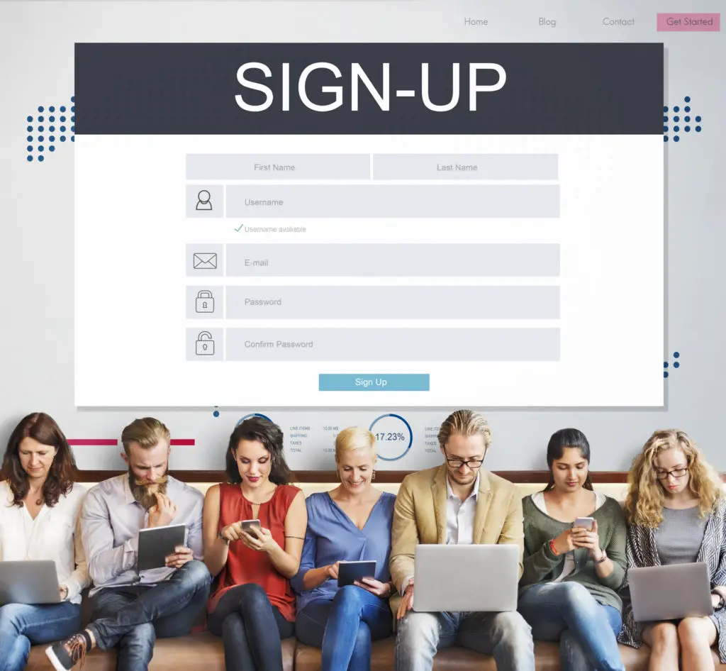 Sign-up page with people on devices in front.