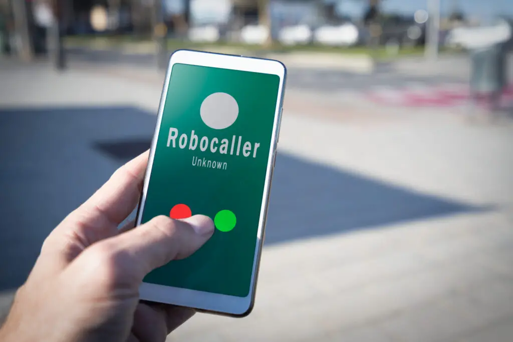 Smartphone showing a call from a robocaller on screen