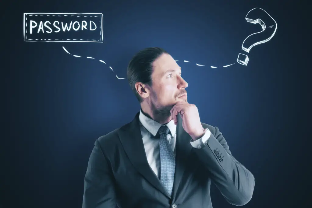 Businessman with a question mark next to the text 'password' on a blue background, illustrating the confusion between password vs passphrase